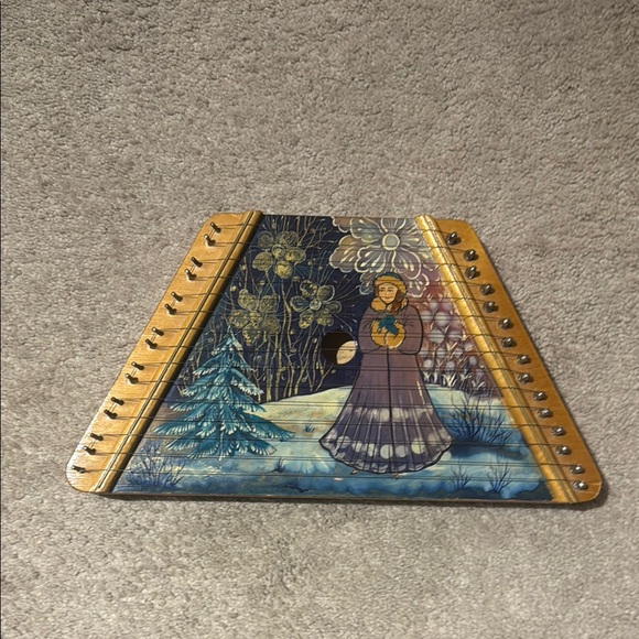 Hand-Painted Musical Instrument with Winter Scene